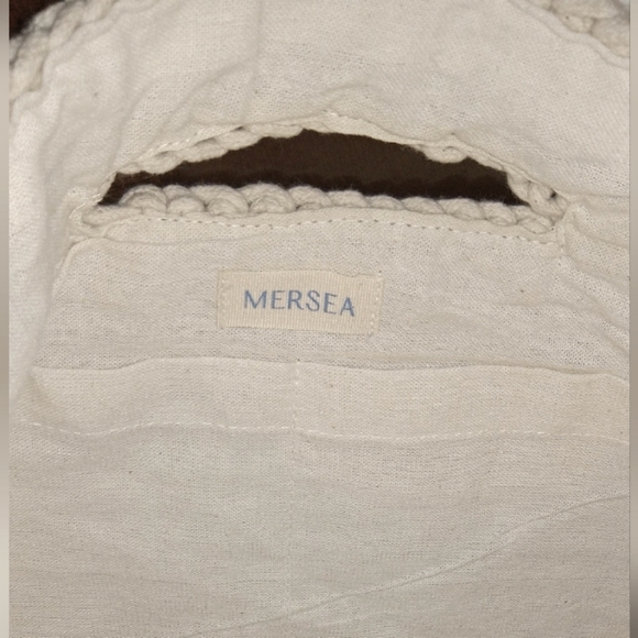 Chic Cream Textured Clutch for Summer by Mersea